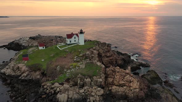 Nubble Lighthouse in Maine at Sunrise Drone Video