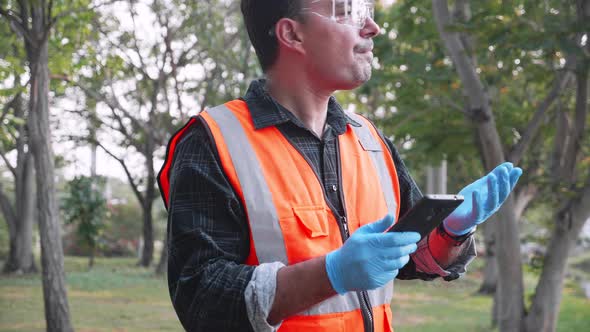 Engineer use smartphone doing working at site