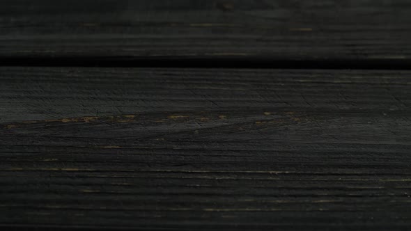 Bitcoins Fall on the Dark Boards. Close Up alt