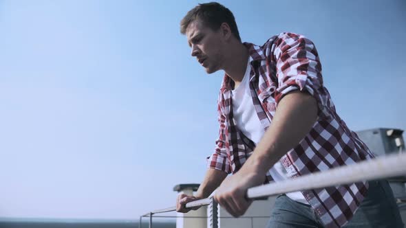 Scared Male Looking Down Standing Rooftop, Fear of Heights, Problem Hopelessness