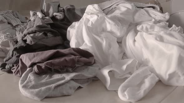 Laundry Piling Up in the Bathroom  Slider Shot alt
