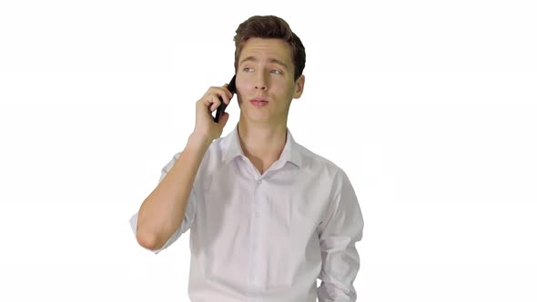 Handsome Man Having Phone Talk While Walking on White Background alt