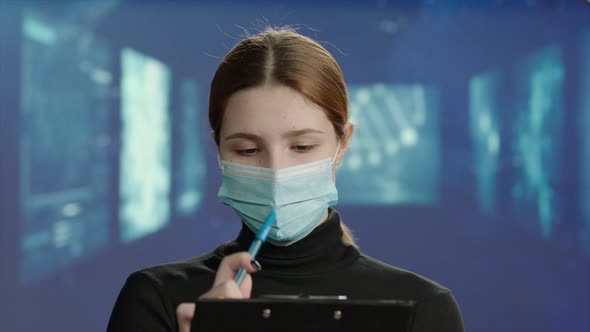 Female Portrait of Biotechnologist Checking New Data in the Laboratory alt
