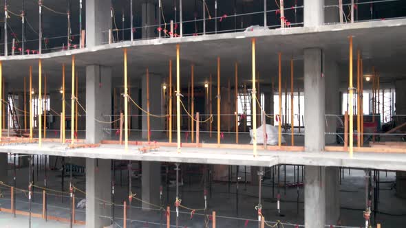 Aerial shot of a new high-rise building under construction alt