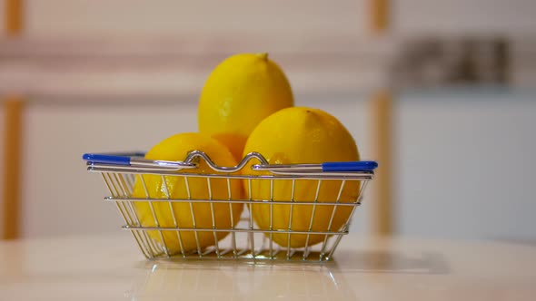 Ripe Peeled Lemons In A Grocery Cart. Lemons Are Spinning On The Table In A Cart From Supermarket alt