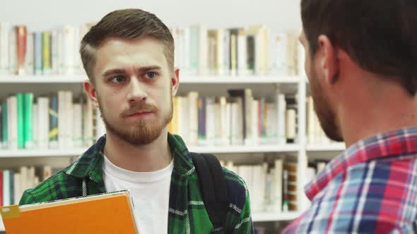 Two Serious Young Men Talk About Something alt