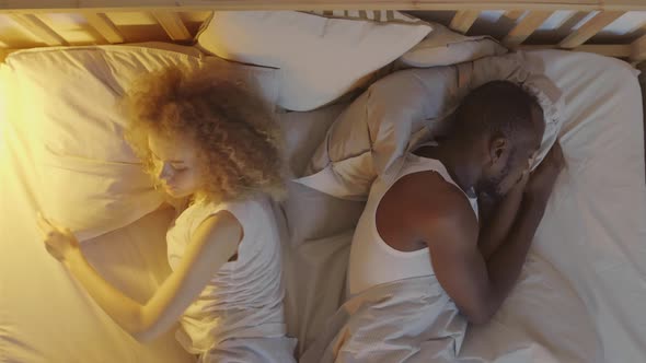 Errant Husband Hiding Smartphone from Wife alt