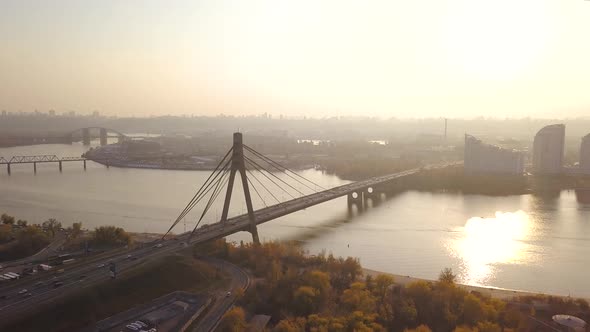 Aerial: The Pivnichniy bridge in Kiyv in autumn, sunset alt