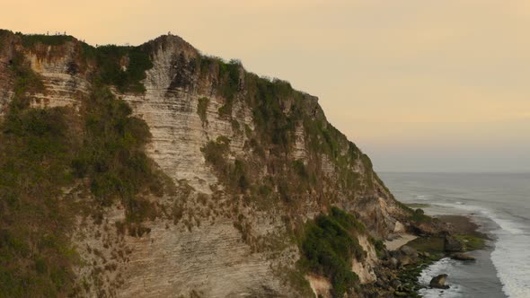 Aerial Drone Flight Over Secret Beach Uluwatu Bali Indonesia alt