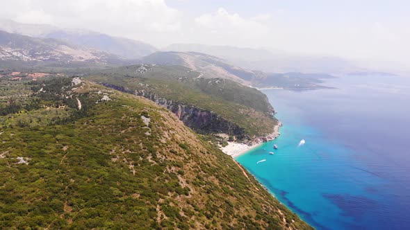 Aerial Drone View of Gjipe Beach and Canyon Dhermi Albania Hidden Paraside with Boats Tourists alt