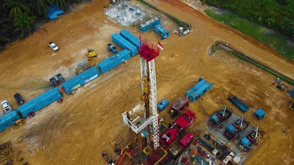Cinematic Drone Shot of Onshore Drilling and Workover Rig structure and Rig equipment for oil explor alt