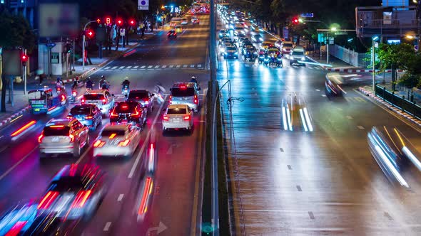traffic cars at the intersection of the city at night