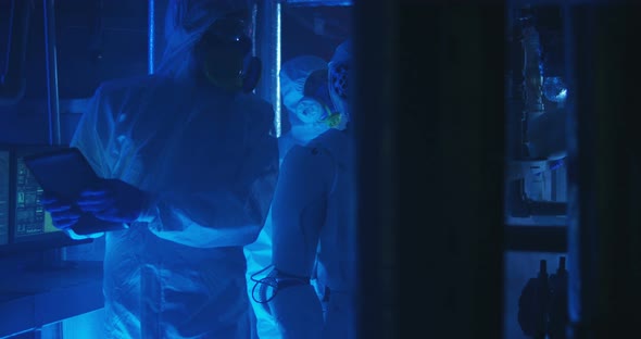 Scientists and Robot Conducting Maintenance Work alt