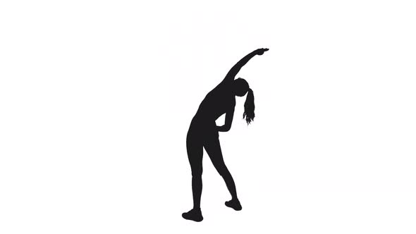 Silhouette Of Slender Girl Doing Stretching Exercises