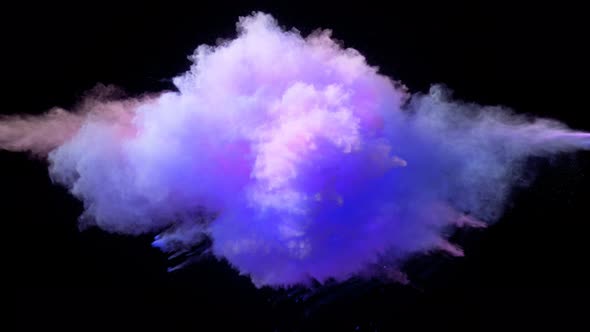 Super Slowmotion Shot of Color Powder Explosion Isolated on Black Background alt