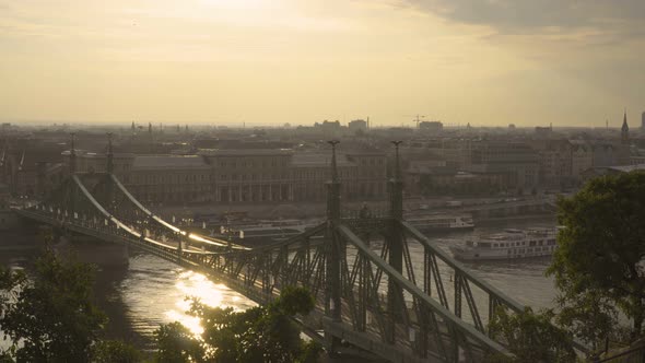 Boat and Liberty Bridge