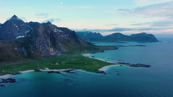Fly over the sea and view on Flakstad and Skagsanden beach,Lofoten Islands