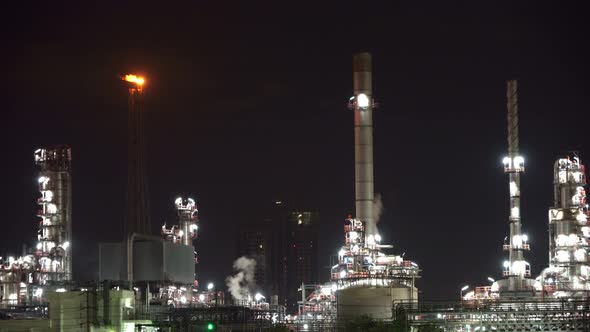 Petrochemical oil refinery and sea in industrial engineering in Bangna, Bangkok, Thailand. alt
