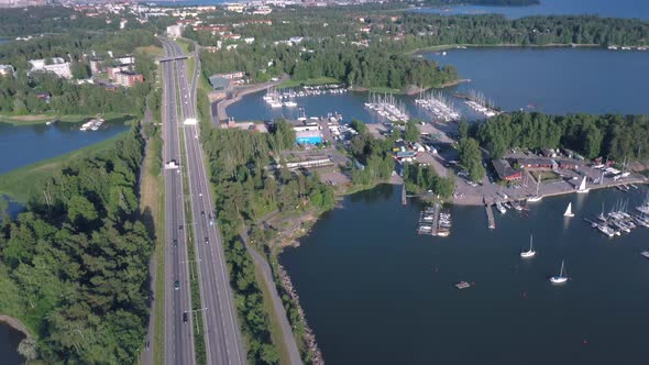 Aerial View of the Cars Passing Through Bridge in Lauttasaari in Helsinki