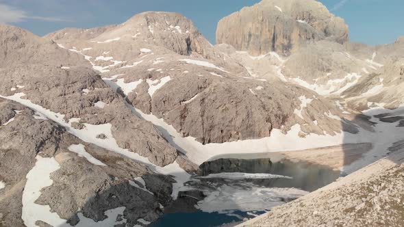 Aerial Shot Unveiling Mountain and Alpine Lake Antermoia  in Dolomites Italy
