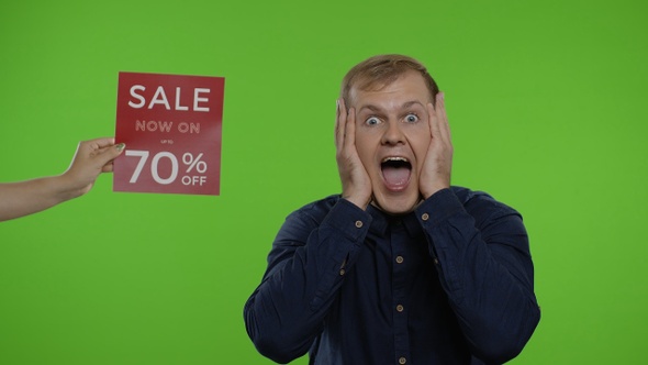 Inscription Sale Now On Up To 70 Percent Off Appears Next To Smiling Man. Guy Celebrating Discounts alt