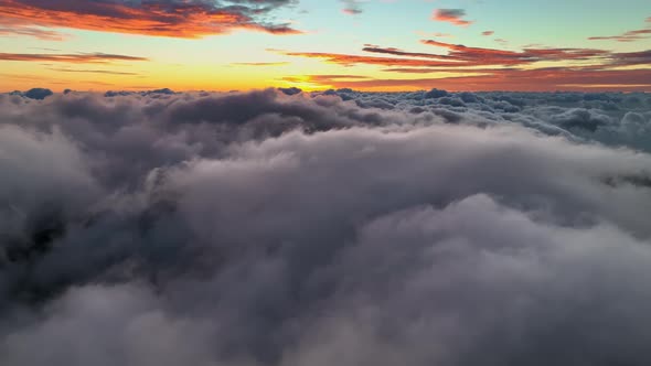 Flight at Dawn Over Dense Clouds alt