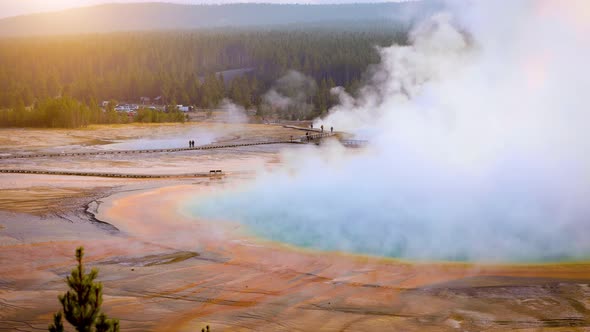 Steam rising from the Grand Prismatic Spring in Yellowstone alt
