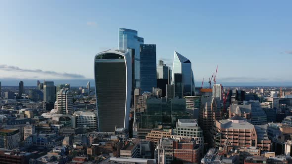Slide and Pan Footage of Group of Modern Skyscrapers in City Financial Hub alt