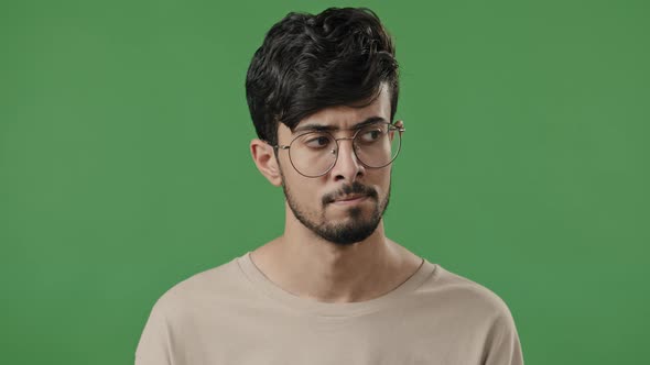 Clever Arab Man Teacher in Eyeglasses Think Hold Hand on Chin Deep in Thought Indian Guy Student alt