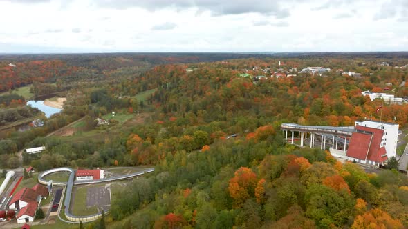 Autumn Landscape Aerial View of the Bobsleigh and Skeleton Track Luge Track Sigulda  alt