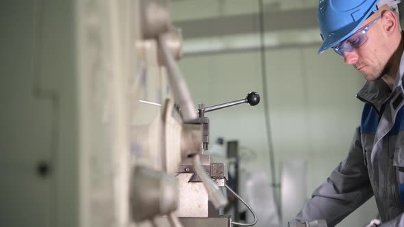 Metal Lathe Operator During Metal Processing alt