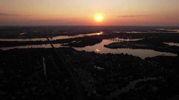 Aerial Beautiful View Of The Kyiv City And Dnieper River And At Sunset