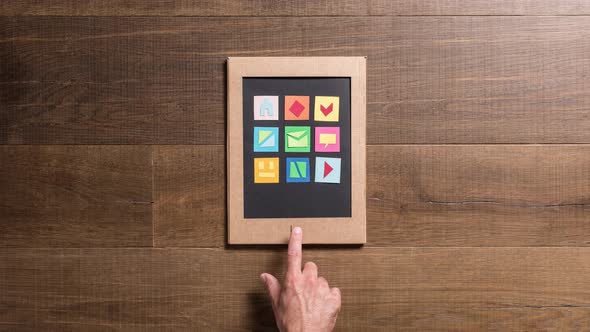 Man using a digital tablet and sending e-mails