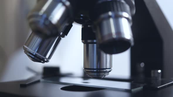 microscope close-up. automated research. search for germs and viruses alt