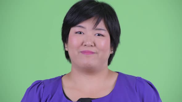 Face of Happy Young Overweight Asian Woman Nodding Head Yes, Stock Footage