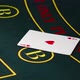 Croupier Deal Cards, Shows Two on Green Table at Casino - VideoHive Item for Sale