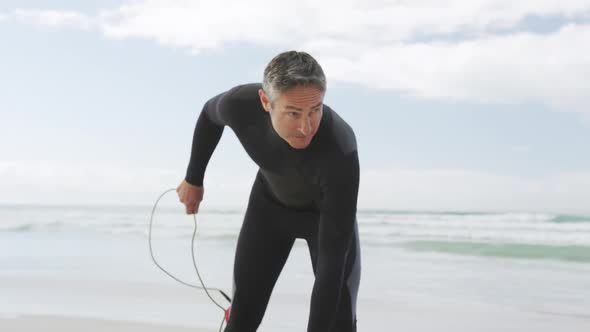 Father and young adult son enjoying outdoor activities together alt