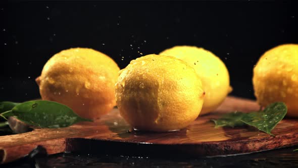 Water Drips Onto a Ripe Lemon alt