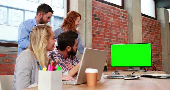 Casual Business Team Having a Meeting alt