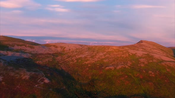 Mountains lit by midnight sun in Norway alt
