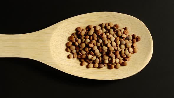 Lentils Appear In Wooden Spoon