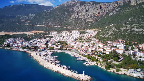 The top view from the drone of Kas resorts, bay, yahts, city in Mugla in Turkey alt