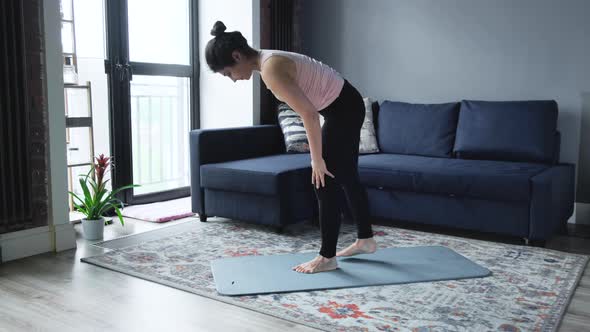 Young Indian Woman Doing Yoga At Home. Closeup Shot Of A Young Female Athlete Performing Yoga alt