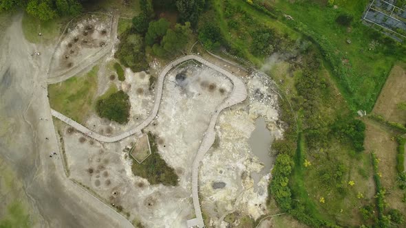Aerial View Of Hot Springs Steam Coming From Ground