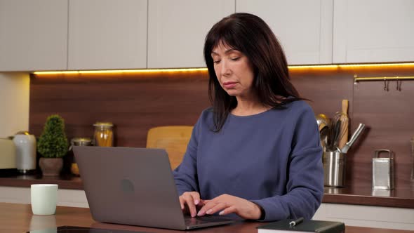 Tired Aged Woman Works Laptop Rubs Neck Stretches Tense Muscles Long Hard Work alt