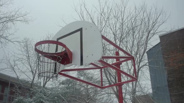Basketball Net Covered with Snow alt
