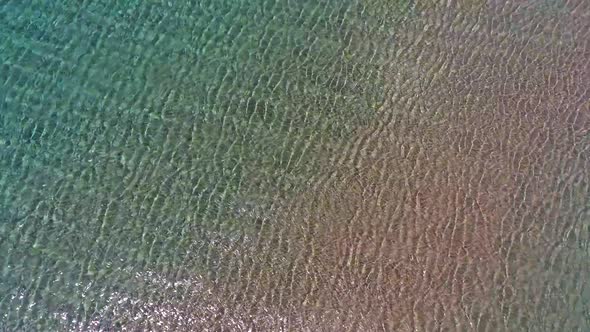 Clear Shallow Water on the Sand Sea Floor