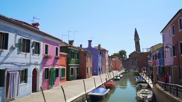 Tourists Walking on Beautiful Street With Colorful Houses in Burano, Venice alt