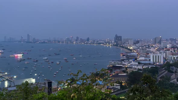 Pattaya bay and Bali Hai Pier, from viewpoint, day to night, Chonburi, Thailand - Time Lapse