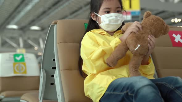 Little girl with teddy bear alt